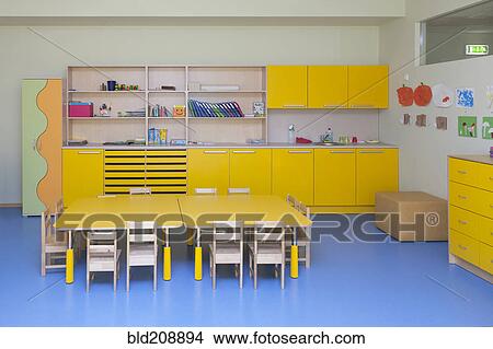 Classroom, activity room with furniture, tables and chairs View Large Photo Image Picture - Classroom, activity room with furniture, tables and chairs. Fotosearch