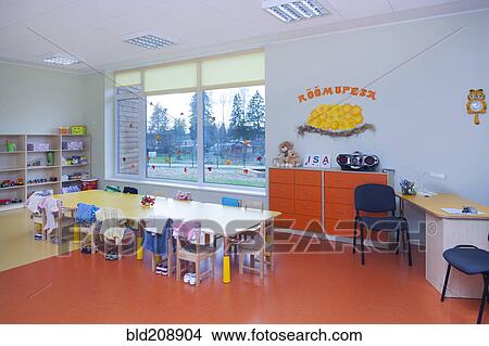 Picture - Classroom, activity room with furniture, tables and chairs. Fotosearch