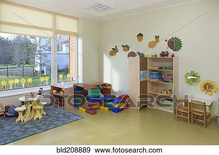 Stock Photo - Classroom, activity room with furniture, tables and chairs. Fotosearch
