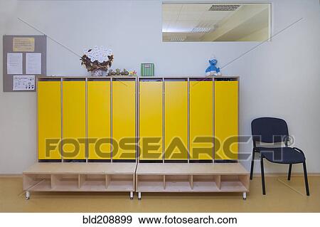 Stock Photo - Classroom, activity room with furniture, tables and chairs. Fotosearch
