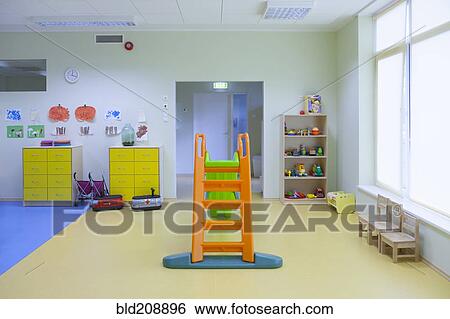 Stock Photograph - Classroom, activity room with furniture, tables and chairs. Fotosearch