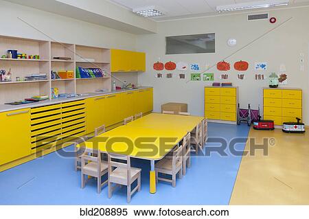 Stock Photography - Classroom, activity room with furniture, tables and chairs. Fotosearch