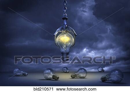 Stock Image - Claw grabbing illuminated light bulb. Fotosearch