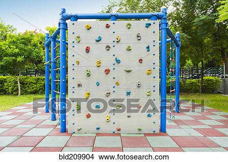 Climbing wall at playground View Large Photo Image Picture - Climbing wall at playground. Fotosearch