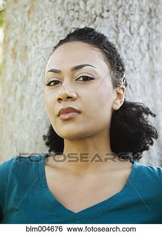 Close up of African woman View Large Photo Image Stock Photograph - Close up of African woman. Fotosearch