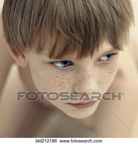 Close up of Caucasian boy's face View Large Photo Image Stock Photograph - Close up of Caucasian boy's face. Fotosearch