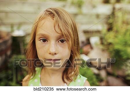 Stock Photography - Close up of Caucasian girl's face. Fotosearch