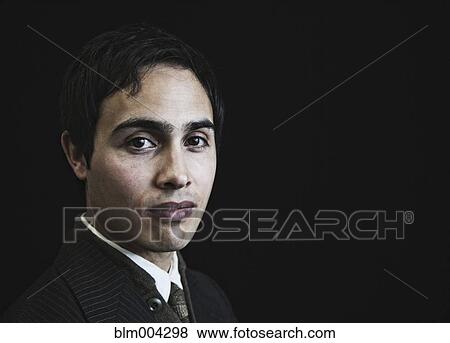 Stock Photo - Close up of mixed race businessman. Fotosearch