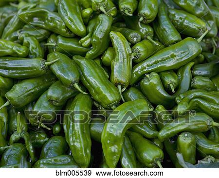 Stock Photo - Close up of pile of green chilies. Fotosearch