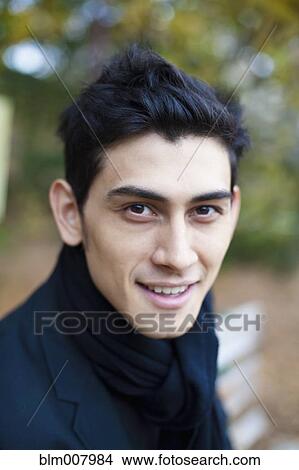 Picture - Close up of smiling mixed race man. Fotosearch