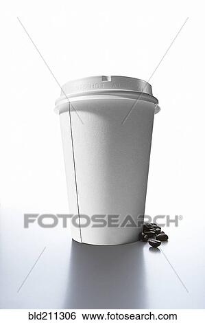 Stock Photograph - Coffee beans and paper cup. Fotosearch