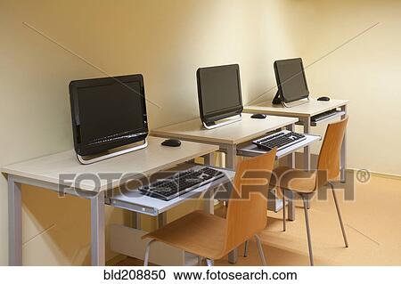 Computer room, desk and IT equipment View Large Photo Image Stock Image - Computer room, desk and IT equipment. Fotosearch