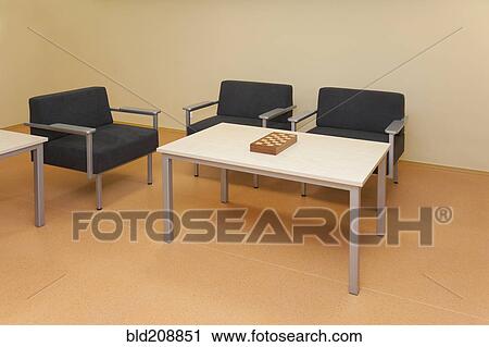Stock Image - Computer room, desk and IT equipment. Fotosearch