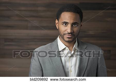 Stock Image - Confident Black businessman. Fotosearch