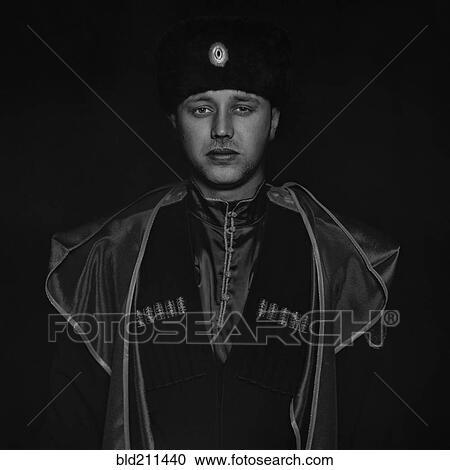 Stock Image - Cossack soldier wearing uniform. Fotosearch