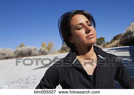 Cuban woman enjoying the sunshine View Large Photo Image Stock Photo - Cuban woman enjoying the sunshine. Fotosearch