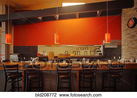 Stock Image - Dining room of modern restaurant interior. Fotosearch