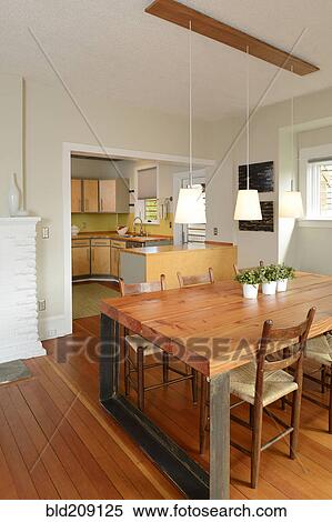 Stock Photography - Dining table in modern craftsman home. Fotosearch