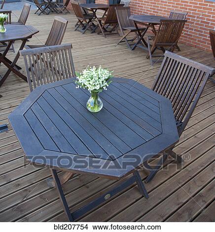 Dining Tables on an Outdoor Deck View Large Photo Image Picture - Dining Tables on an Outdoor Deck. Fotosearch