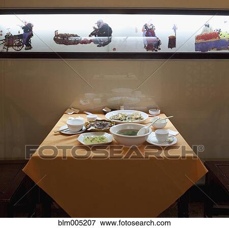 Stock Photo - Dinner in Chinese restaurant. Fotosearch