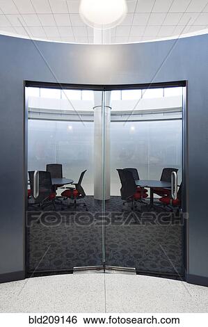 Stock Photograph - Doors to empty business center in airport. Fotosearch