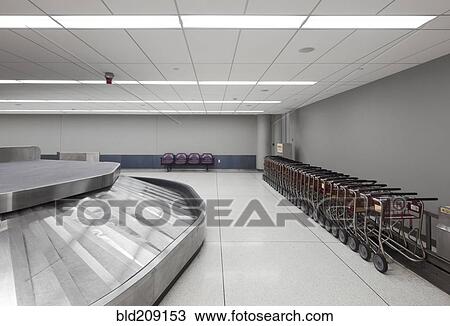 Stock Image - Empty baggage claim area in airport. Fotosearch