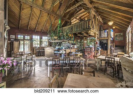 Empty chairs and tables in restaurant View Large Photo Image Stock Image - Empty chairs and tables in restaurant. Fotosearch