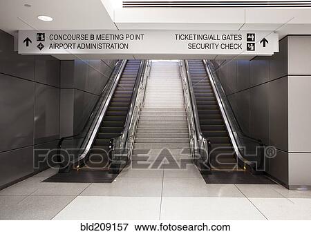 Stock Photo - Empty escalators in airport. Fotosearch