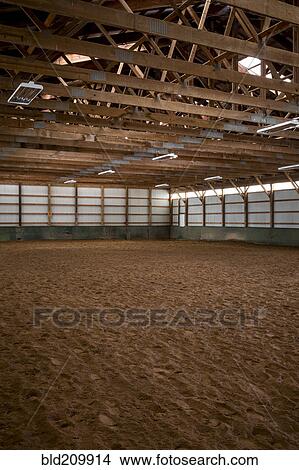 Empty indoor horse riding ring View Large Photo Image Picture - Empty indoor horse riding ring. Fotosearch