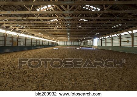 Empty indoor horse riding ring View Large Photo Image Stock Image - Empty indoor horse riding ring. Fotosearch