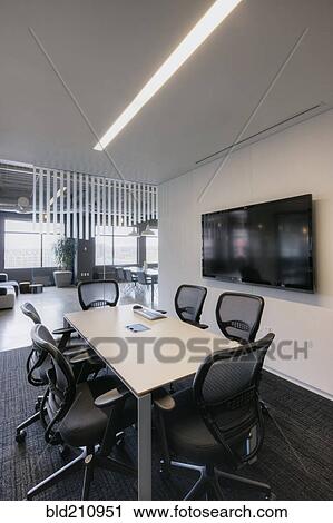 Stock Image - Empty meeting room in office. Fotosearch