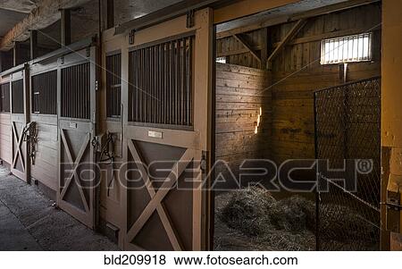 Stock Photo - Empty stables in barn. Fotosearch