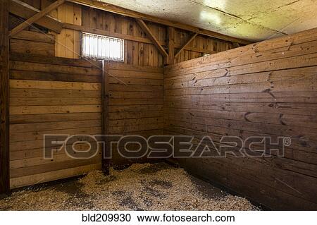 Stock Image - Empty stall in horse stable. Fotosearch