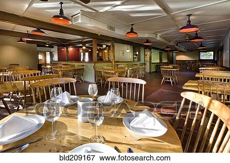 Empty tables and chairs in restaurant View Large Photo Image Stock Photo - Empty tables and chairs in restaurant. Fotosearch