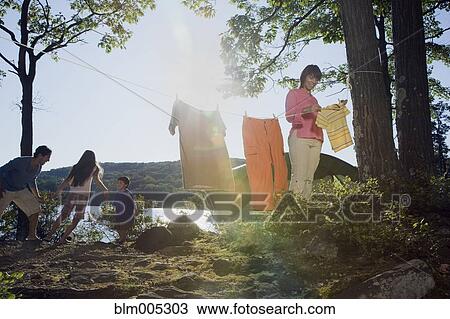 Family camping by lake View Large Photo Image Stock Image - Family camping by lake. Fotosearch
