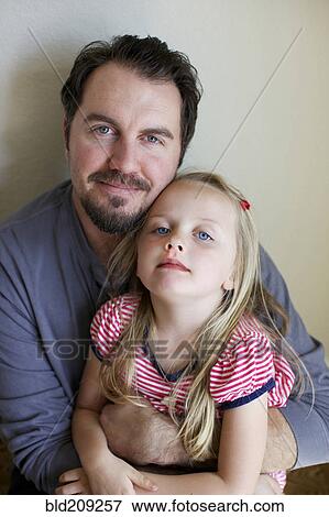 Father and daughter smiling View Large Photo Image Stock Photo - Father and daughter smiling. Fotosearch