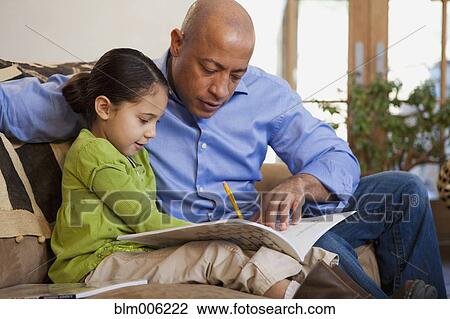 Father helping daughter with homework View Large Photo Image Stock Image - Father helping daughter with homework. Fotosearch