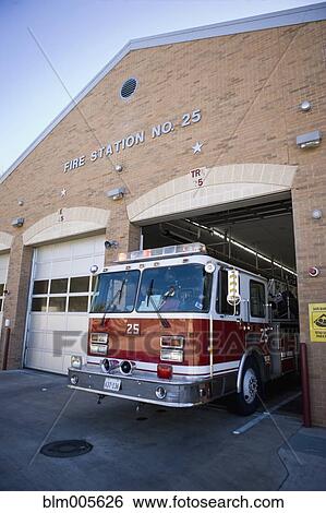 Fire truck leaving fire station View Large Photo Image Stock Photograph - Fire truck leaving fire station. Fotosearch