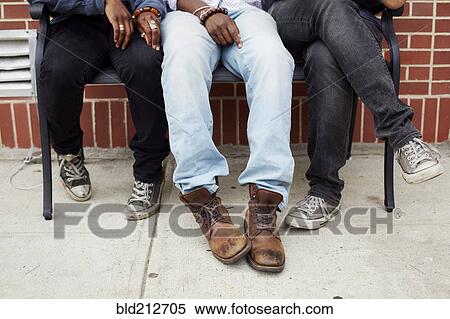 Friends' feet on city street View Large Photo Image Stock Photography - Friends' feet on city street. Fotosearch