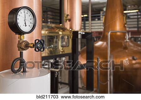 Gauge and copper stills in distillery View Large Photo Image Stock Image - Gauge and copper stills in distillery. Fotosearch