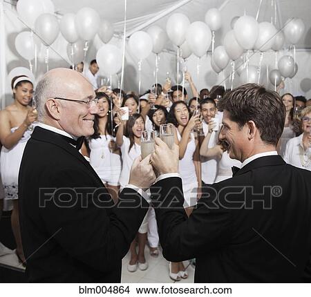Gay married couple enjoying wedding reception View Large Photo Image Picture - Gay married couple enjoying wedding reception. Fotosearch