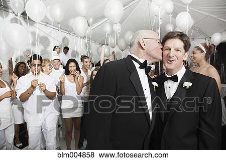 Stock Photo - Gay married couple enjoying wedding reception. Fotosearch