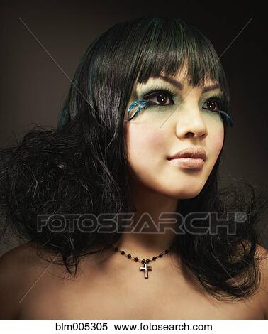 Glamorous Asian woman with extreme makeup View Large Photo Image Stock Photography - Glamorous Asian woman with extreme makeup. Fotosearch