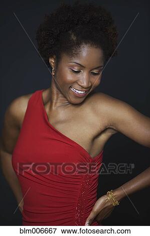 Glamorous Black woman in evening gown View Large Photo Image Stock Photo - Glamorous Black woman in evening gown. Fotosearch