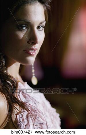 Stock Photo - Glamorous woman in nightclub. Fotosearch