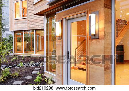 Stock Photo - Glass windows and doors of modern house. Fotosearch