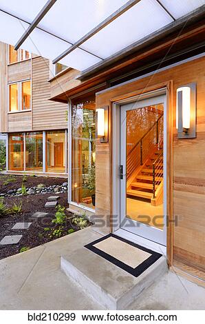 Stock Photo - Glass windows and doors of modern house. Fotosearch