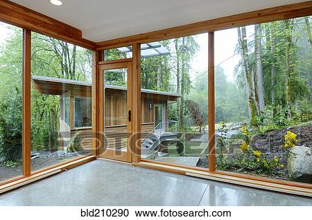 Stock Image - Glass windows in modern home. Fotosearch