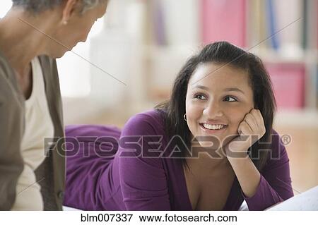 Stock Photo - Grandmother and granddaughter relaxing. Fotosearch