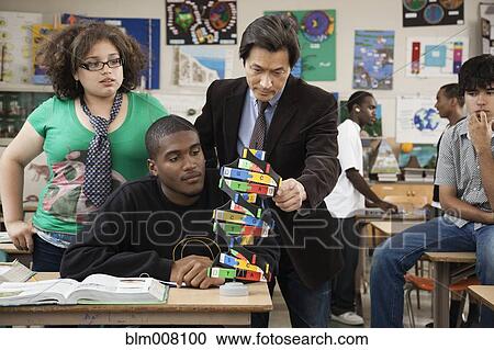 High school student listening to science teacher View Large Photo Image Stock Image - High school student listening to science teacher. Fotosearch